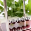 A-Physics-Project-of-Newton-cradle-energy-transfer